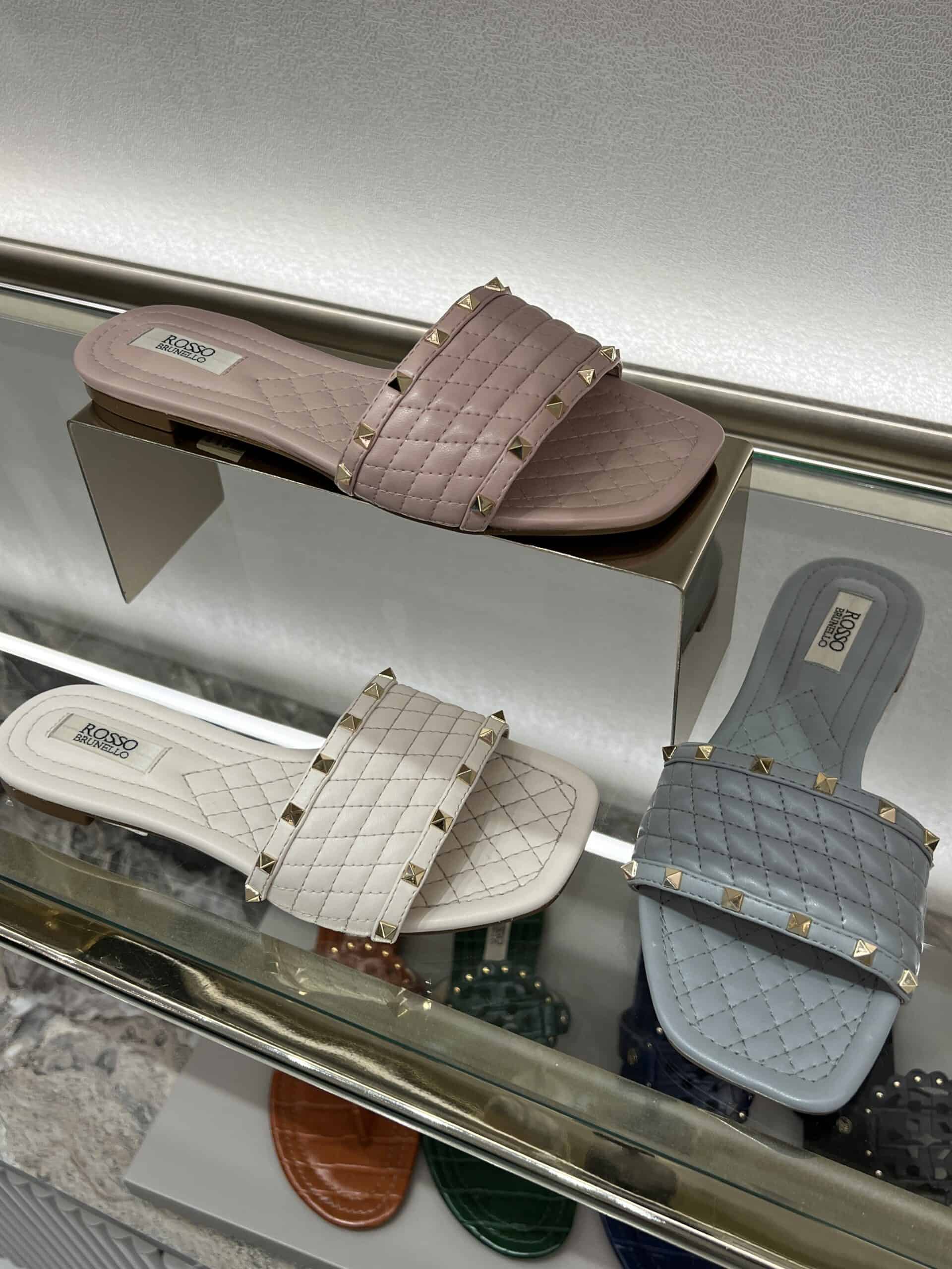 retail women ss23 flat sandals slide leather matelasse studs pastels blue pink white rosso brunello